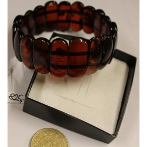 Armbnd i gyldent rav