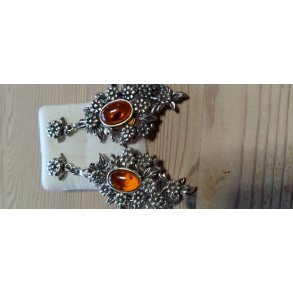 Lange reringe med slvblomster